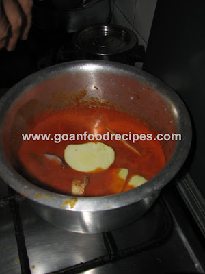 Add Mango Pieces to Fish Curry