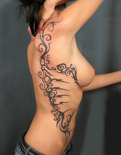 spine. tattoo. J"doc"'s photostream. Discovering Tribal Body Tattoo Ideas
