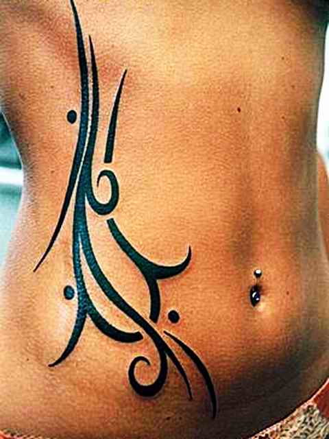 Tribal Rib Cage Tattoo | Media List I'm also liking the tats on the side of