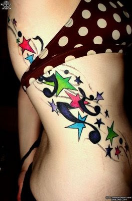 music note tattoo and star rib girls