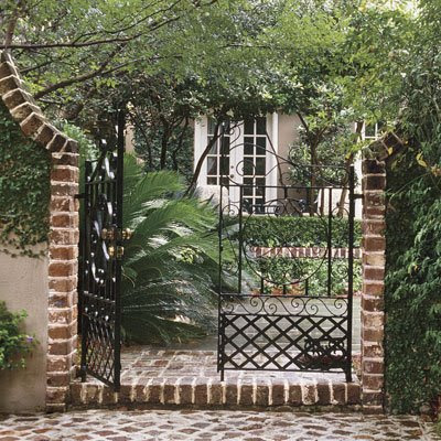 Living Charleston on An Enticing Entrance To A Pretty Courtyard Garden In Charleston