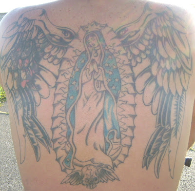 chris honors his mother with back piece tattoo