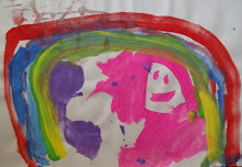 "Nena con arco iris"