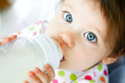 [baby with bottle.jpg]