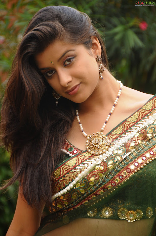 Madhurimaupcoming hot Telugu Actresslow waist see through saree showseducing exposuresexy in green hot photos