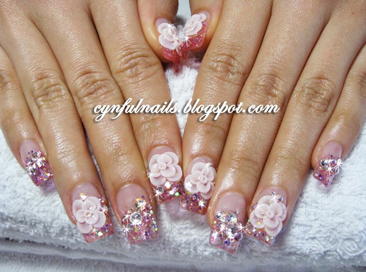 This set of pink glitter gel nails is super bling in real