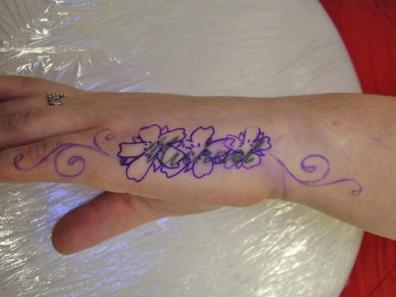 Cover Up Tattoo On Hand Name to Floral