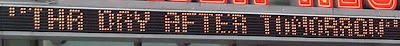 Marquee from the Tower Records storefront. It reads in part, "THA DAY AFTER TOMORROW."