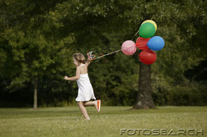 [little-girl-running-with-balloons-outside-~-ks109221.jpg]