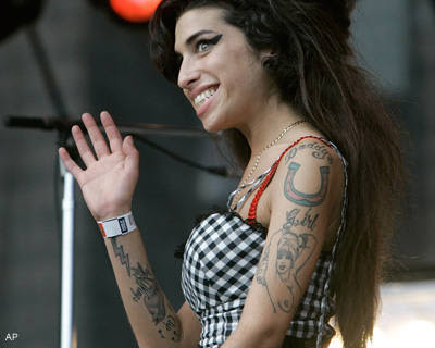 Tattoo Pictures on Amy Winehouse Tattoos   Ideas And Pictures
