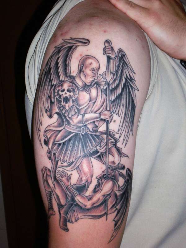 Arch angel fighting demon tattoo.
