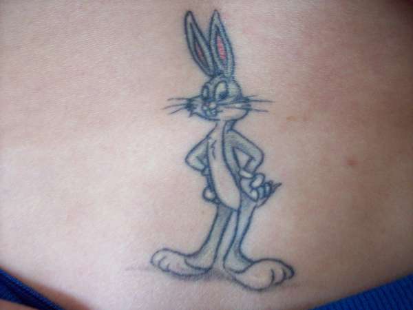 Bus Bunny tattoo stomach.