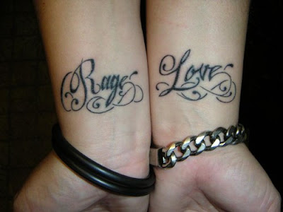 Rage and Love wrist tattoos