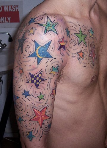 Colorful stars shoulder tattoo