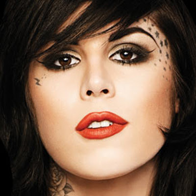 Tribal face tattoo idea for girls. K Von D face tattoo of stars and small 