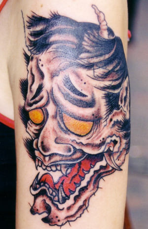 Demon tattoos commonly have very exaggerated features such as eyes and teeth 