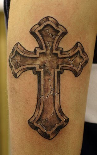 tattoos pictures cross. Cross tattoos are typically seen on the upper arm and across the back and 