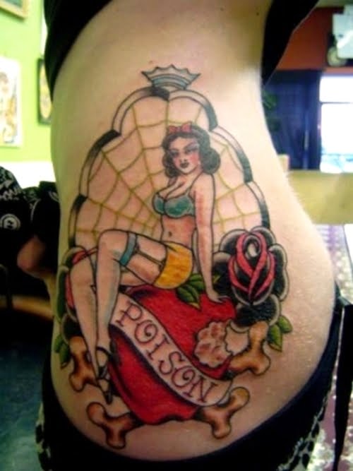 tattoos for girls on hip bone. Pinup girl with heart, bones and roses.