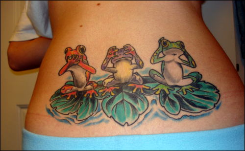 cute lower back tattoos. on lower back of girl.