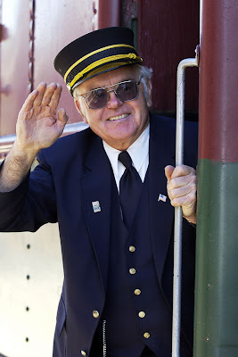 lar_Conductor%28Getting_Here-PassengerRail%29.jpg
