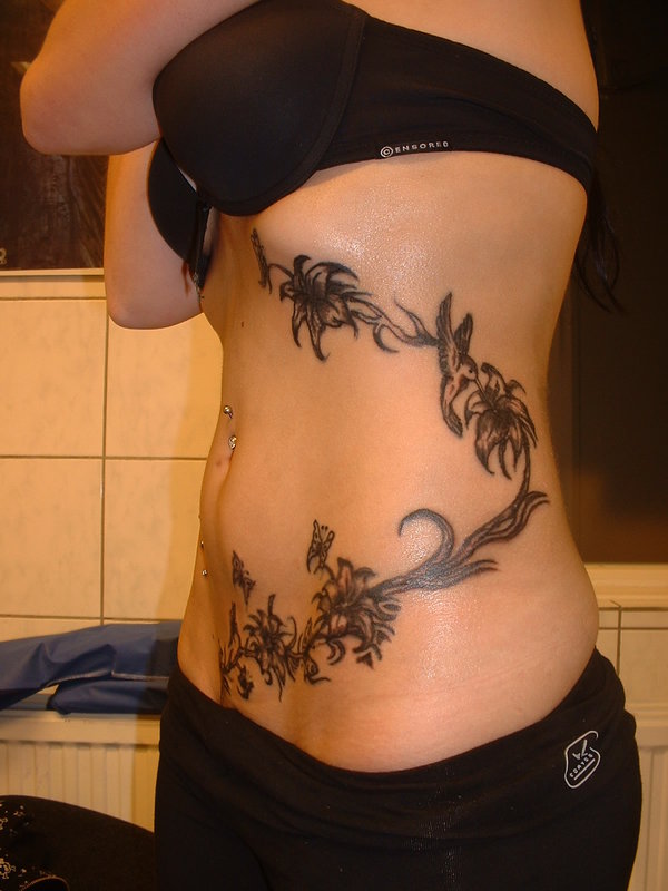 Flower Tattoo Design Ideas Picture Gallery. Posted by ram at 1:02 AM