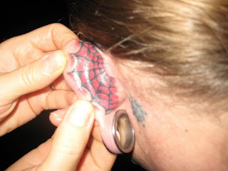 Johnny Hollywood Ear Tattoos