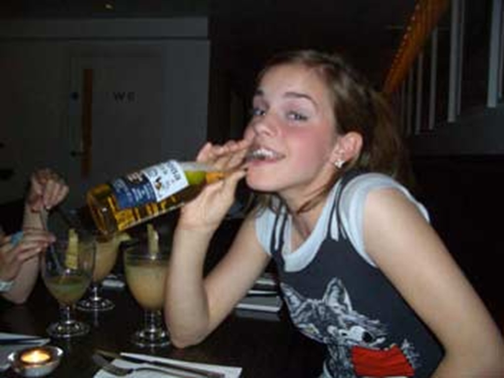 Emma Watson drinking a beer at a bar, the caption reads, "Alcohol - Because 