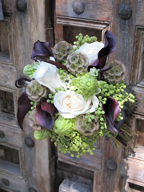 Schwartz Calla Lilies with Roses, Fern Shoots, Ornithogalum and Berries