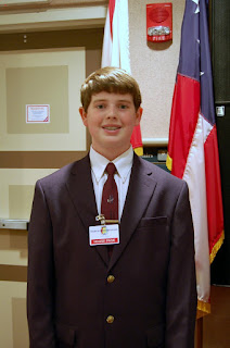 Seventh Grader Zack Hulcher Serves as House Page 1