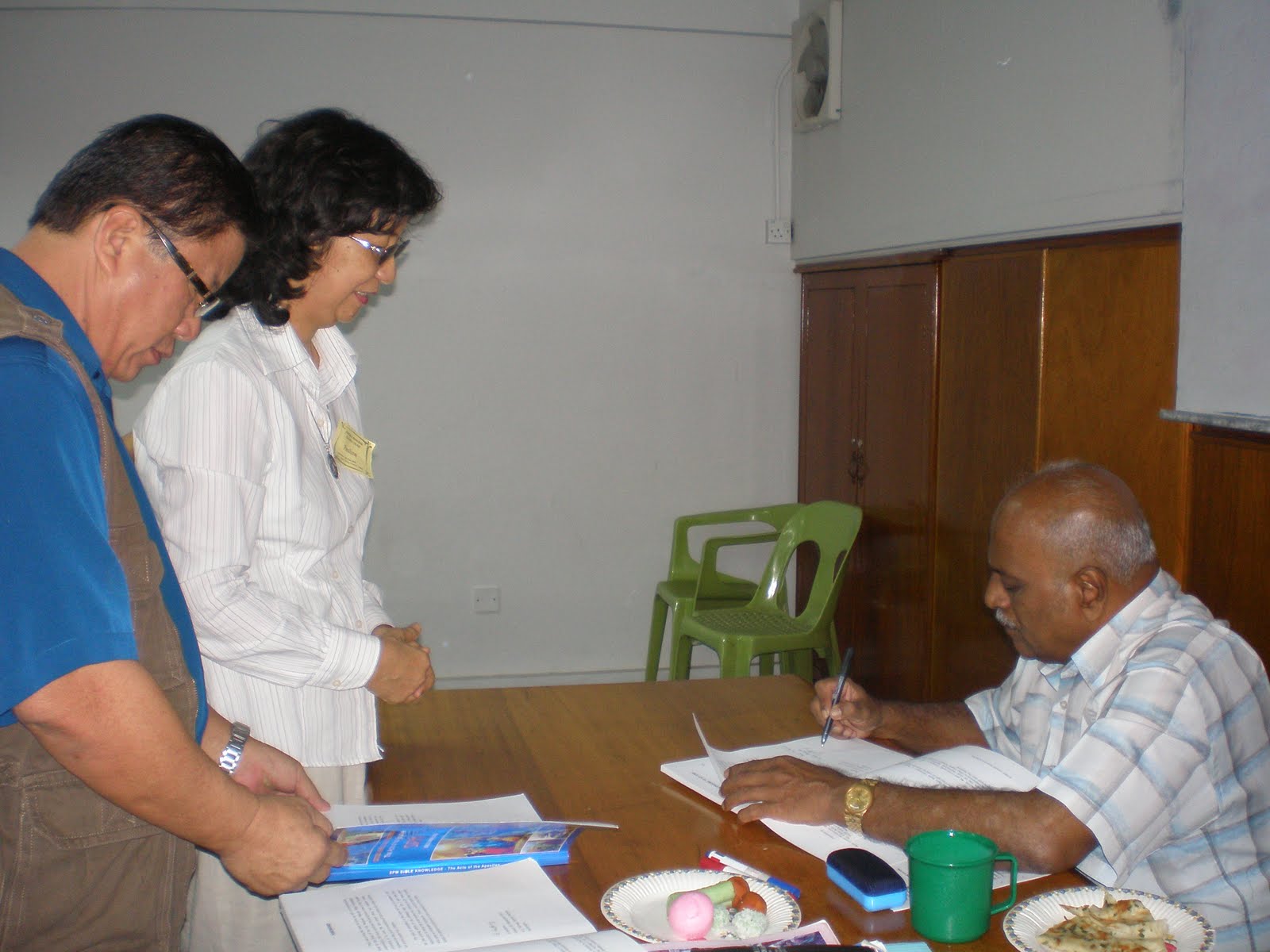 [Signing+his+book.JPG]