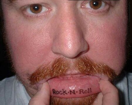 Star lip tattoo.