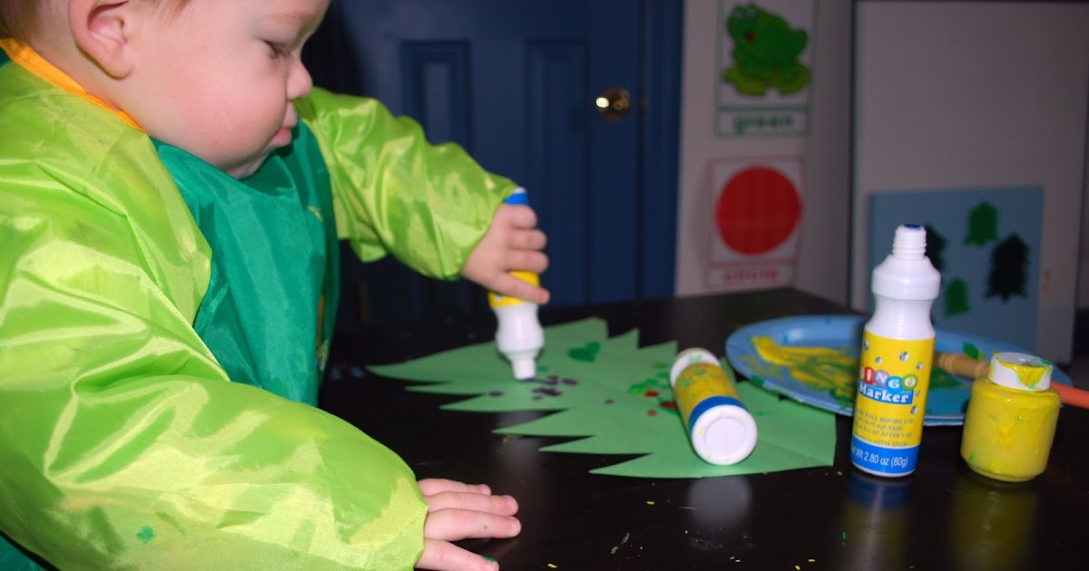 Structured Play Finger Painting a Christmas Tree