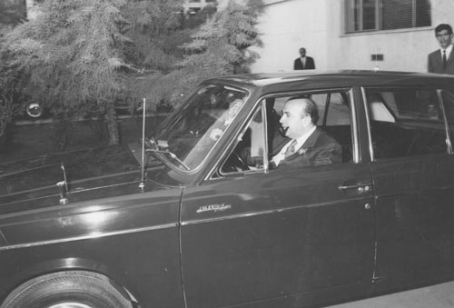 Another photo of Prime Minister AmirAbbas Hoveida driving his Paykan 