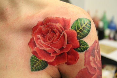blue rose tattoo. Cute little lue rose on this