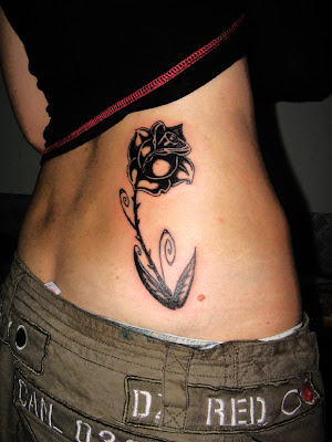 13 roses tattoo. rose tattoos on hip.