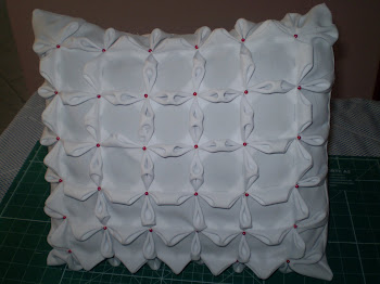 Almofada em ponto fofoca.