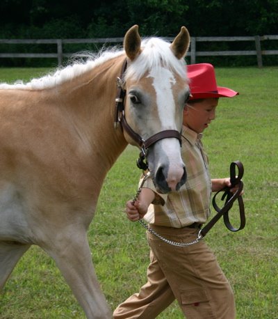 Noah leading Maya at 2007 Allegany County Fair & Ag Expo