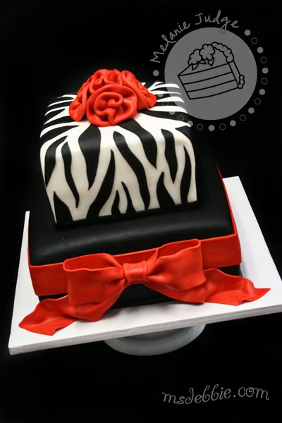 pink and white zebra cake. We topped the cake with red