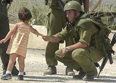 Israeli%20soldier%20shaking%20hands%20with%20a%20Palestinian%20girl.jpg