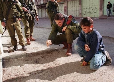 IDF%20officer%20with%20a%20palestinian%20kid.jpg
