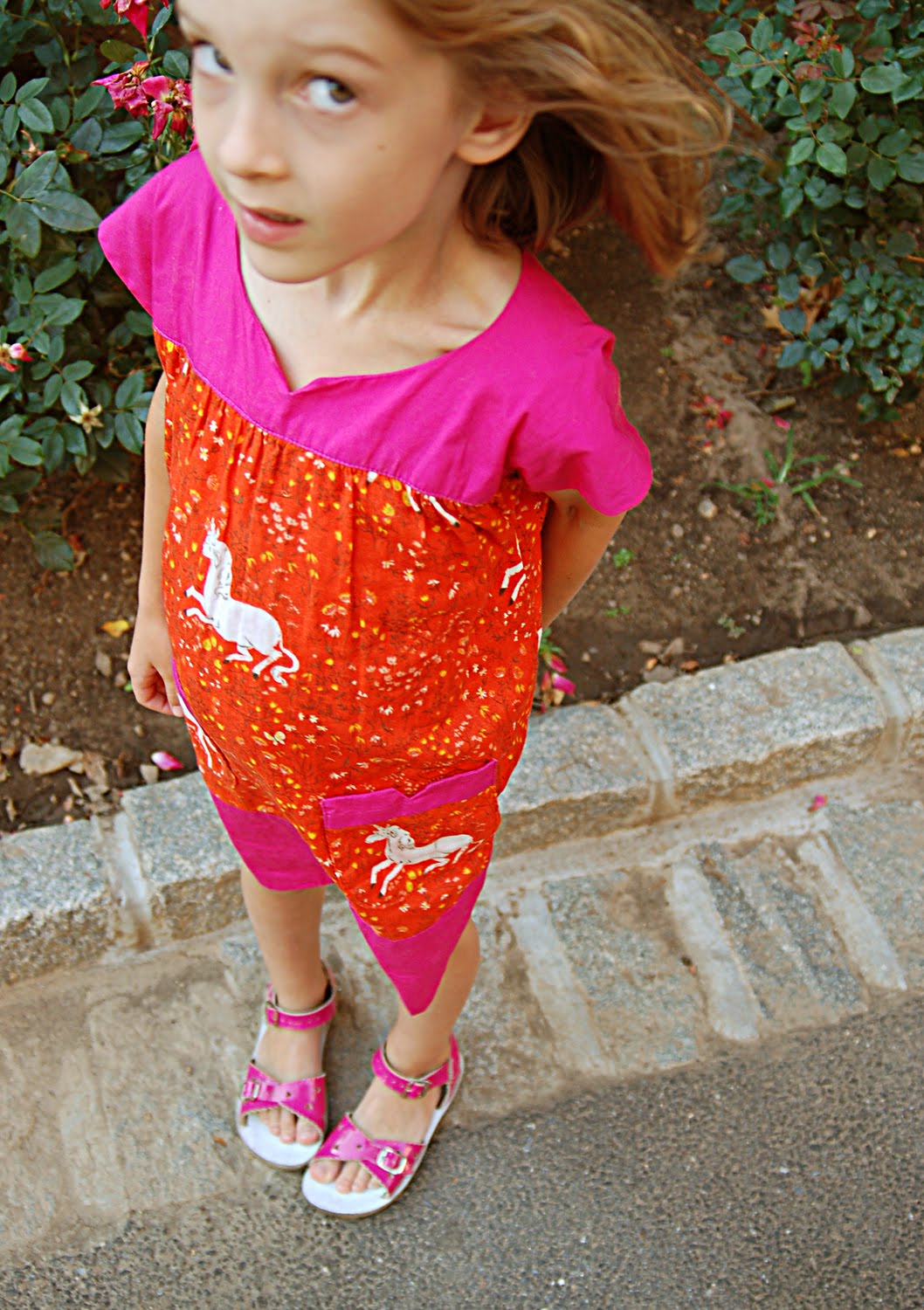 little girl wearing sandals