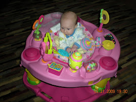 I have my own little world in my new exersaucer!