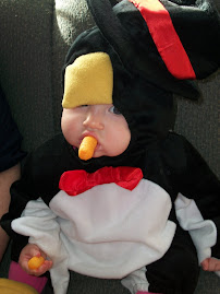 I think Mommy & Daddy are making sure they get their money's worth from this costume.  30Oct09