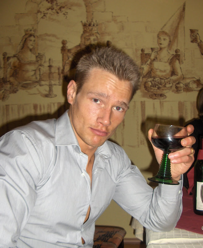Martin Berkhan — Holding a glass of wine