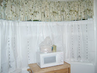 mismatched curtains floral tiers and plain white thin but not sheer tiers