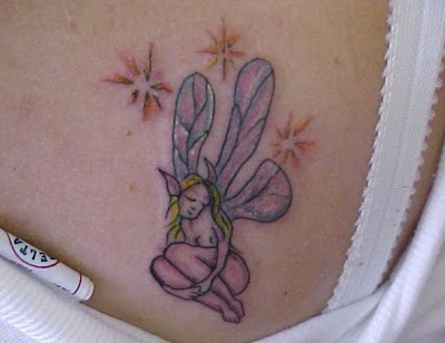 Fairy tattoo and hibiscus