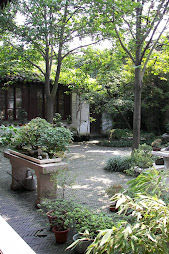A COURTYARD IN THE MASTER OF THE NETS GARDEN
