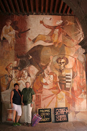 Candy and Susan with a mural at the Institute Allende