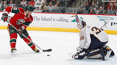 Antii Miettinen skates in on a shootout