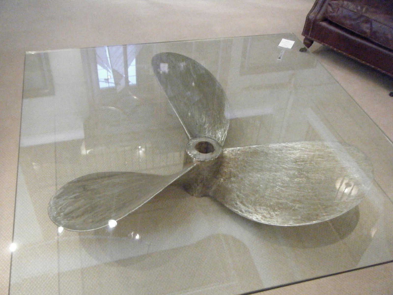 Dovecote Decor Coffee Tables This Glass Topped Table Allows The Focus To Fall Upon Beautiful And Unique Base A Boat Propeller